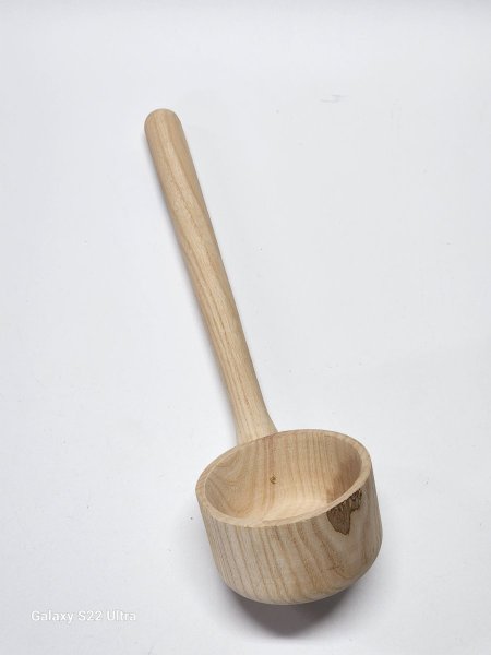 مغرفة خشب مجورة