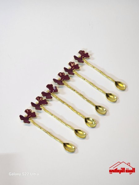 معالق قرفة ذهبي شكل فراشة /6