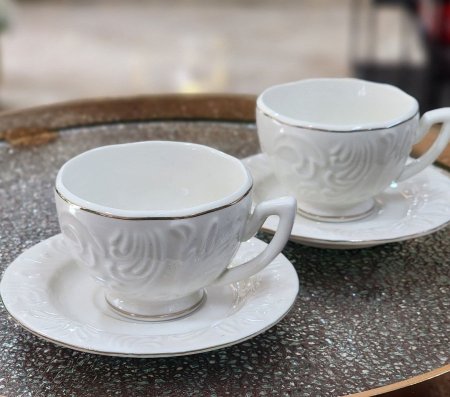 فناجين قهوة بورسلان ابيض مورد 6+6صحون