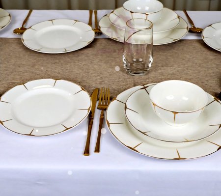 طقم صحون بورسلان ابيض حز بلاتين ذهبي 24قطعة