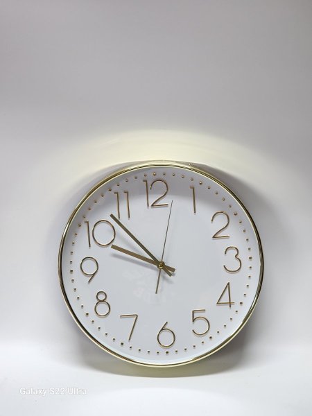 ساعة حائط اطار ذهبي لميع 33سم