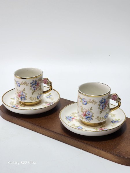 طقم فناجين 12+12صحن بورسلان ابيض مورد ازرق