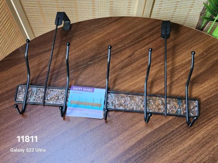 علاقة ملابس حديد باب