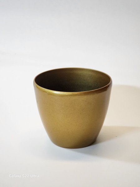 قوار تنسيق بلاستيك ذهبي