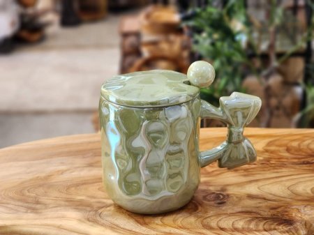 ماج بورسلان مع غطاء معلقة